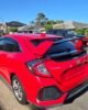 Honda Civic 10th Gen hatchback Type R spoiler installed Civic FK7 rear wing 2 tone red black Honda Civic hatchback rear spoiler blue black installed Type R style spoiler Civic rear view