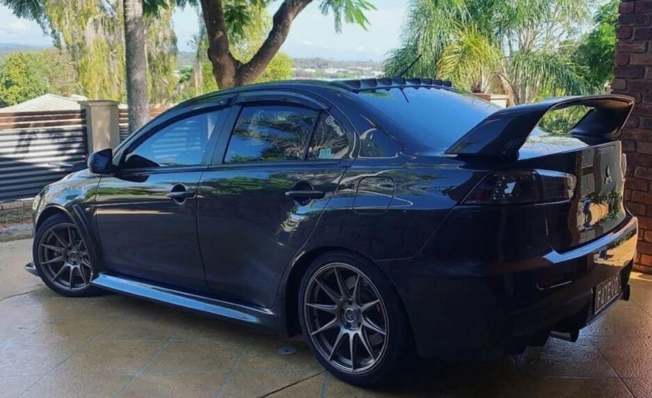 Mitsubishi Lancer roof spoiler gloss black 2007–2017 CJ sedan rear window spoiler installed view