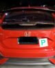 Honda Civic FK7 RS Hatchback red and gloss black Type R style spoiler installed rear view