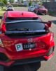 Honda Civic FK7 RS Hatchback red and gloss black Type R style spoiler installed rear view