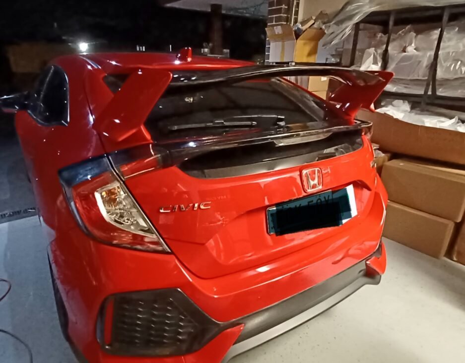 Honda Civic FK7 RS Hatchback red and gloss black Type R style spoiler installed rear view
