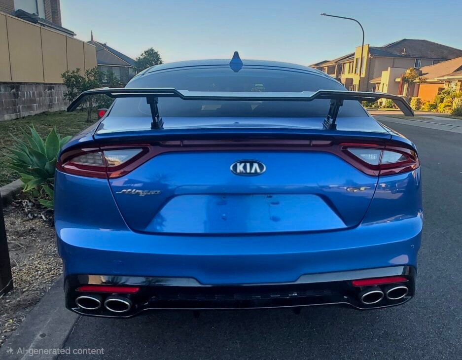 Gloss Black Rear Wing Spoiler fitted to Kia Stinger CK 2018–2023 with ABS spoiler blade and metal mounting brackets